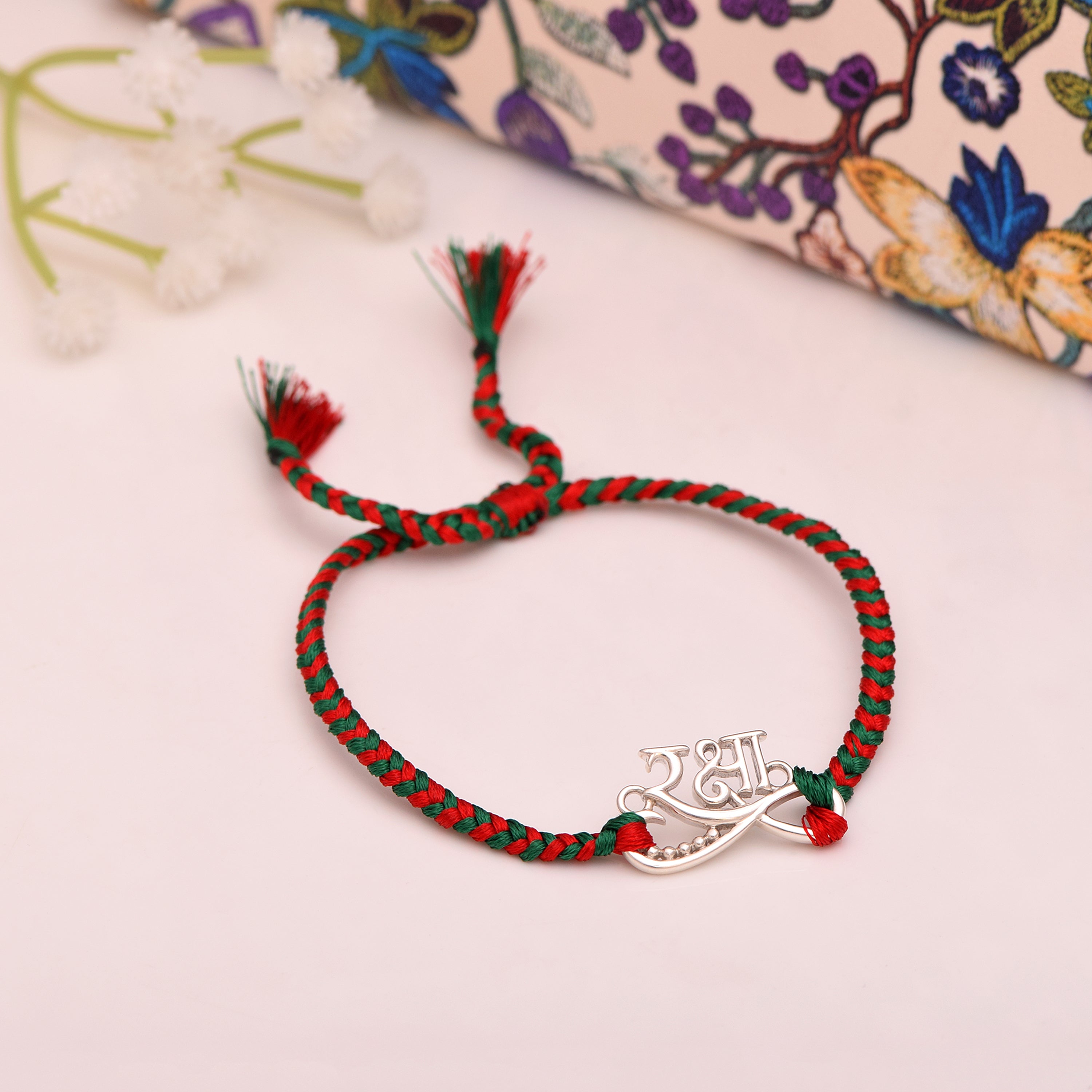 Silver-Tone “रक्षा” Thread Rakhi Bracelet - Sterling Silver
