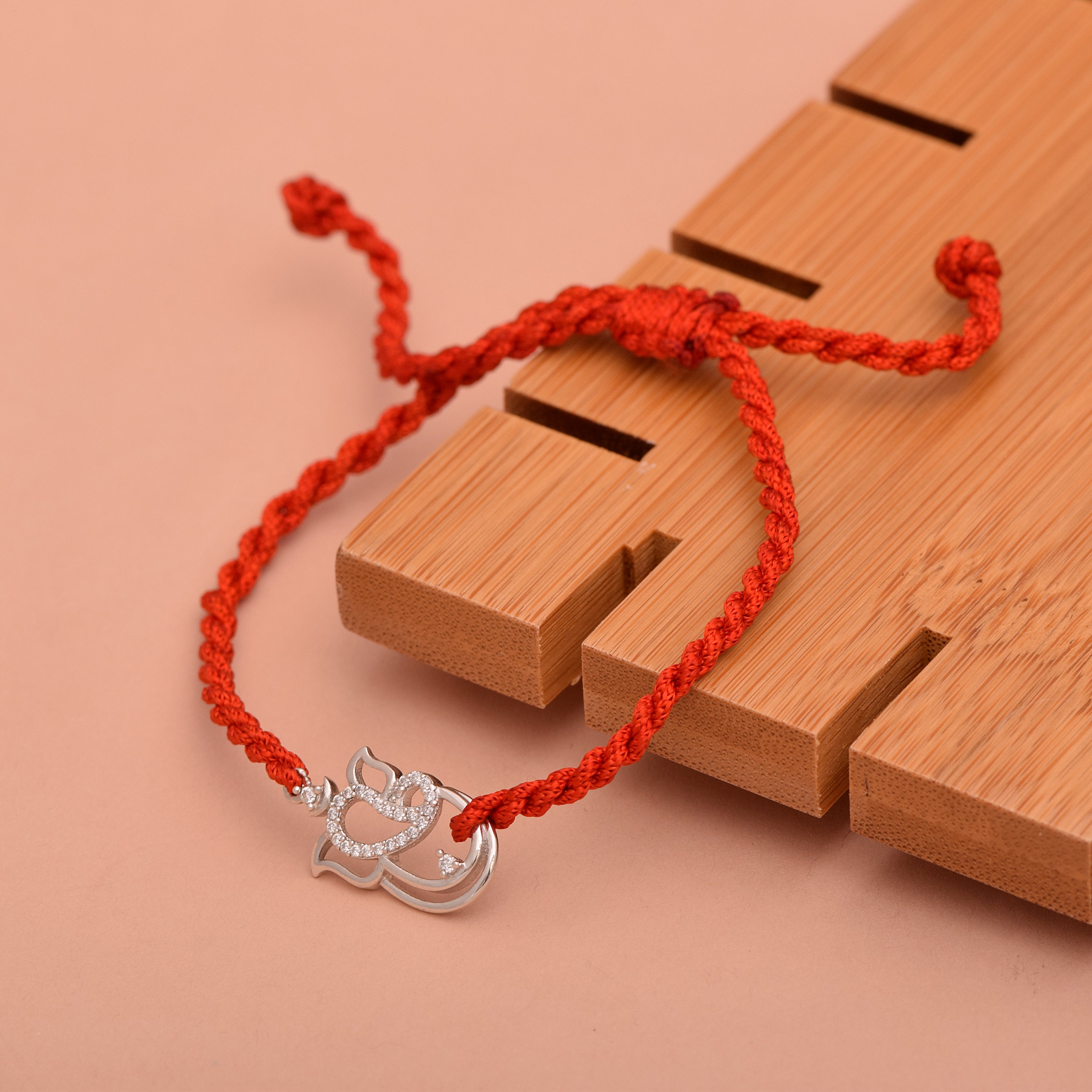 Om Symbol Thread Rakhi Bracelet - Sterling Silver